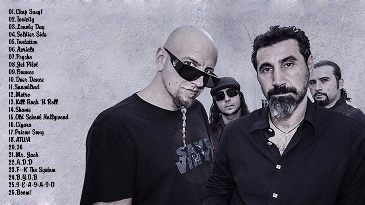 System of a down mountain. Группа System of a down. Систем оф а довн Дарон. Систем оф а довн барабанщик. Зарубежный исполнитель рок с бородой косичкой.