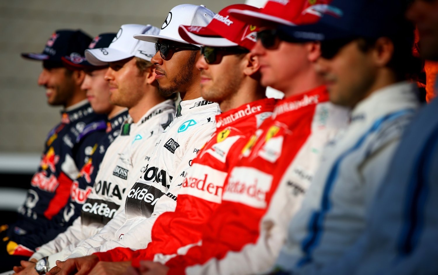 F1 Drivers sit in car